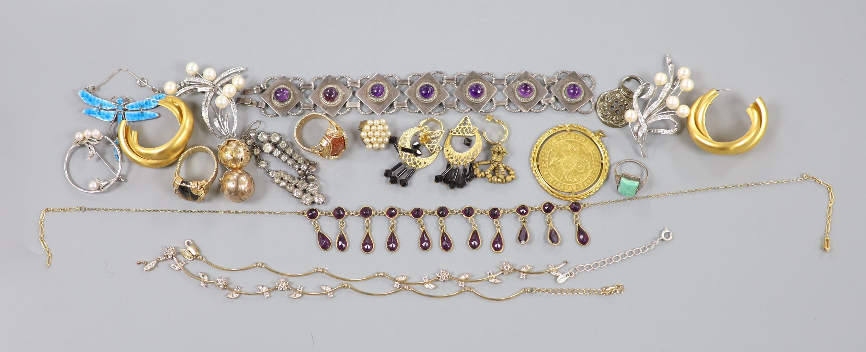 Mixed jewellery including two gilt white metal masonic ball pendants, 14k white metal, diamond and cultured pearl set floral spray brooch, 57mm, gross 11.3 grams and a cabochon amethyst set bracelet.